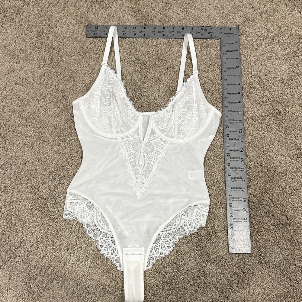 Elegant White Lace Bodysuit